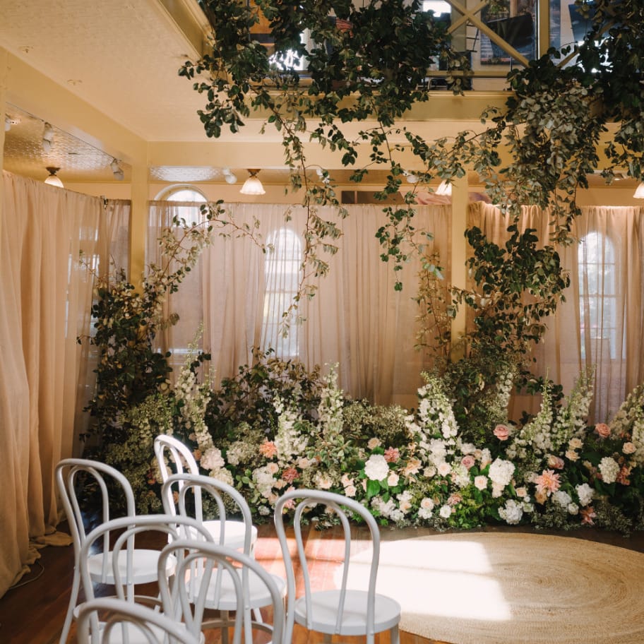 Photo of an exclusive wedding ceremony in Sydney with unique luxe floral venue styling.